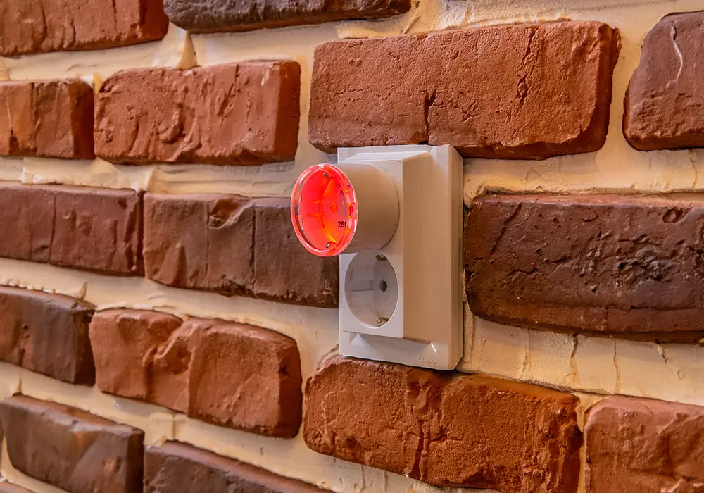 Shelly Plug S Gen3 with a red LED price indicator